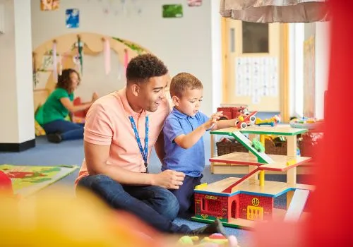 Teacher with preschool student